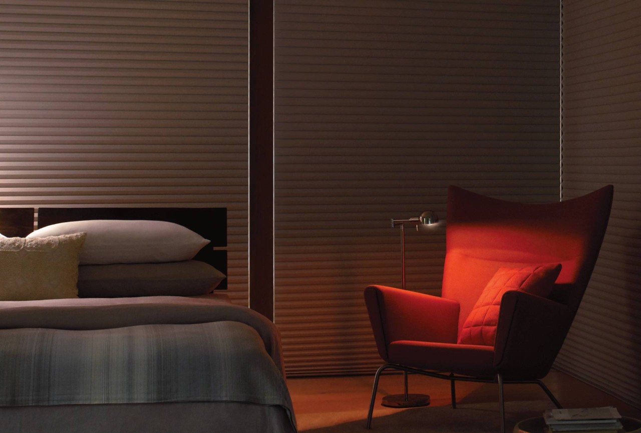 A modern bedroom with room darkening shades near Fargo, ND