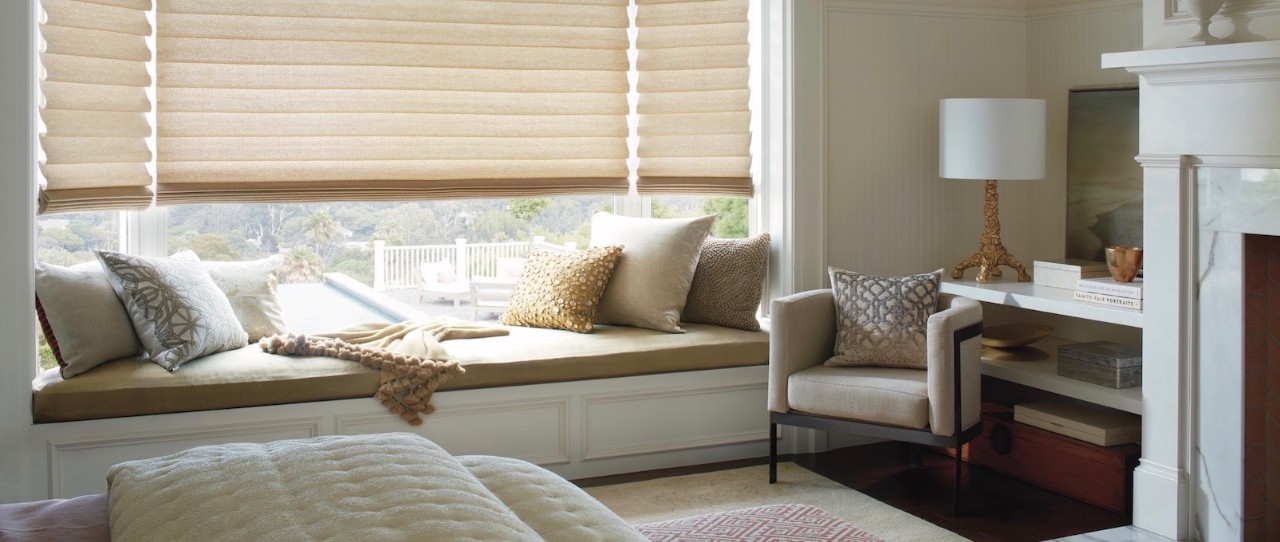 A bedroom with a built-in window bench